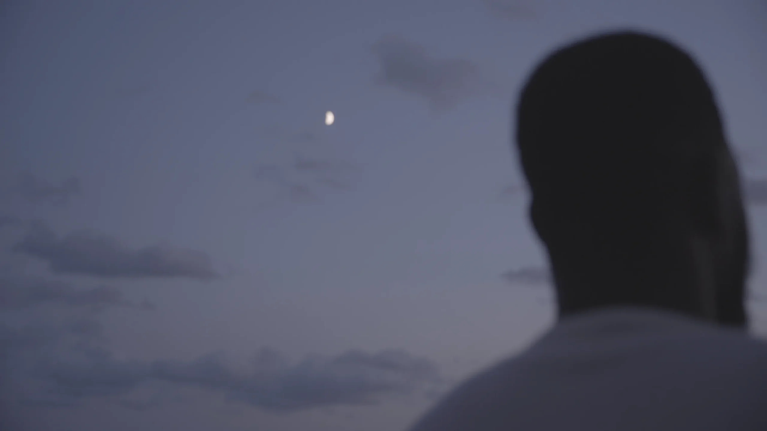 A man in silhouette at dusk — Entre Deux Eaux
